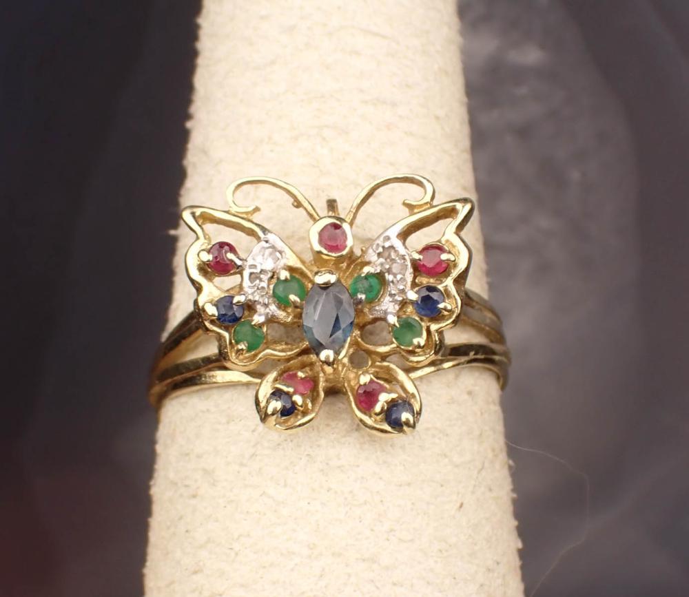 Appraisal: FOURTEEN KARAT GOLD RING WITH PRECIOUS GEMSTONES The yellow and