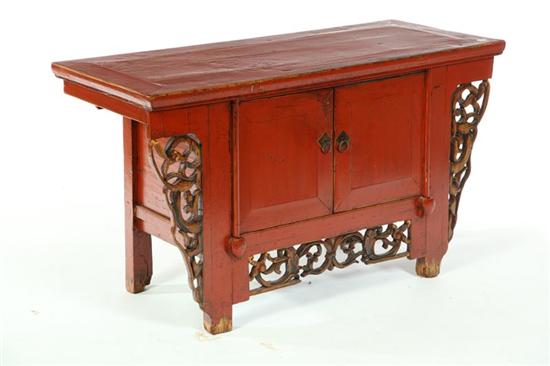 Appraisal: CABINET China th century elm Red lacquer Two doors carved