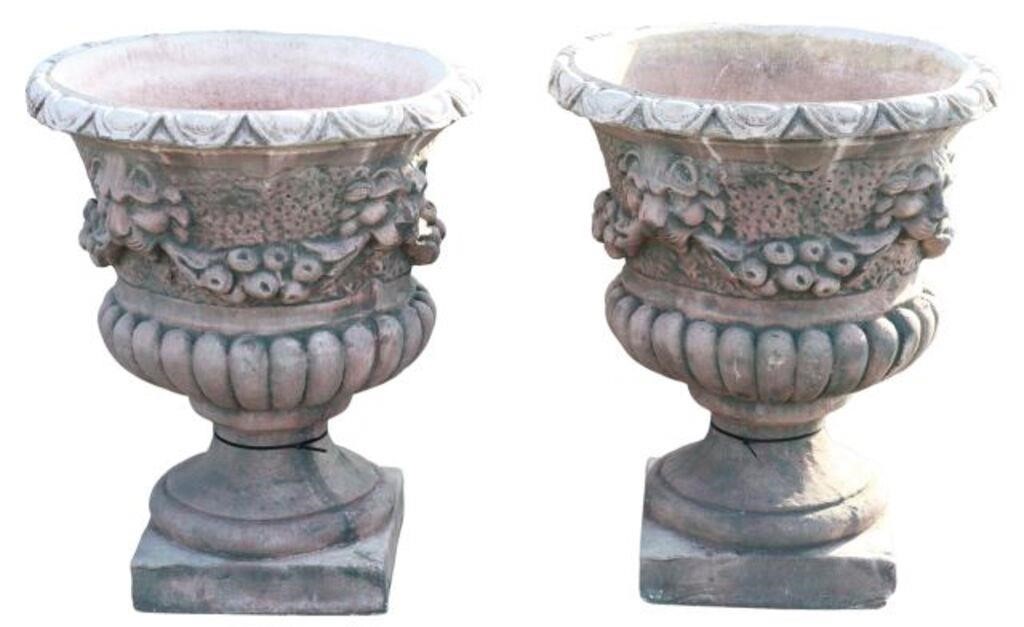 Appraisal: pair Large cast stone campana-form garden urn planters having egg