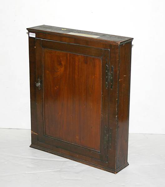 Appraisal: An English mahogany hanging cabinet th century height in width