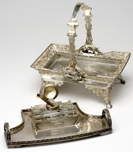 Appraisal: SILVER-PLATED DESK ITEMS Secessionist style inkwell and Gutta-percha pen together