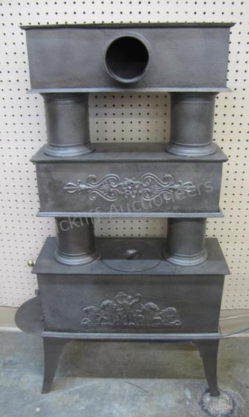 Appraisal: A gray metal Kachelhofen style Scandinavian stove three stack tiers