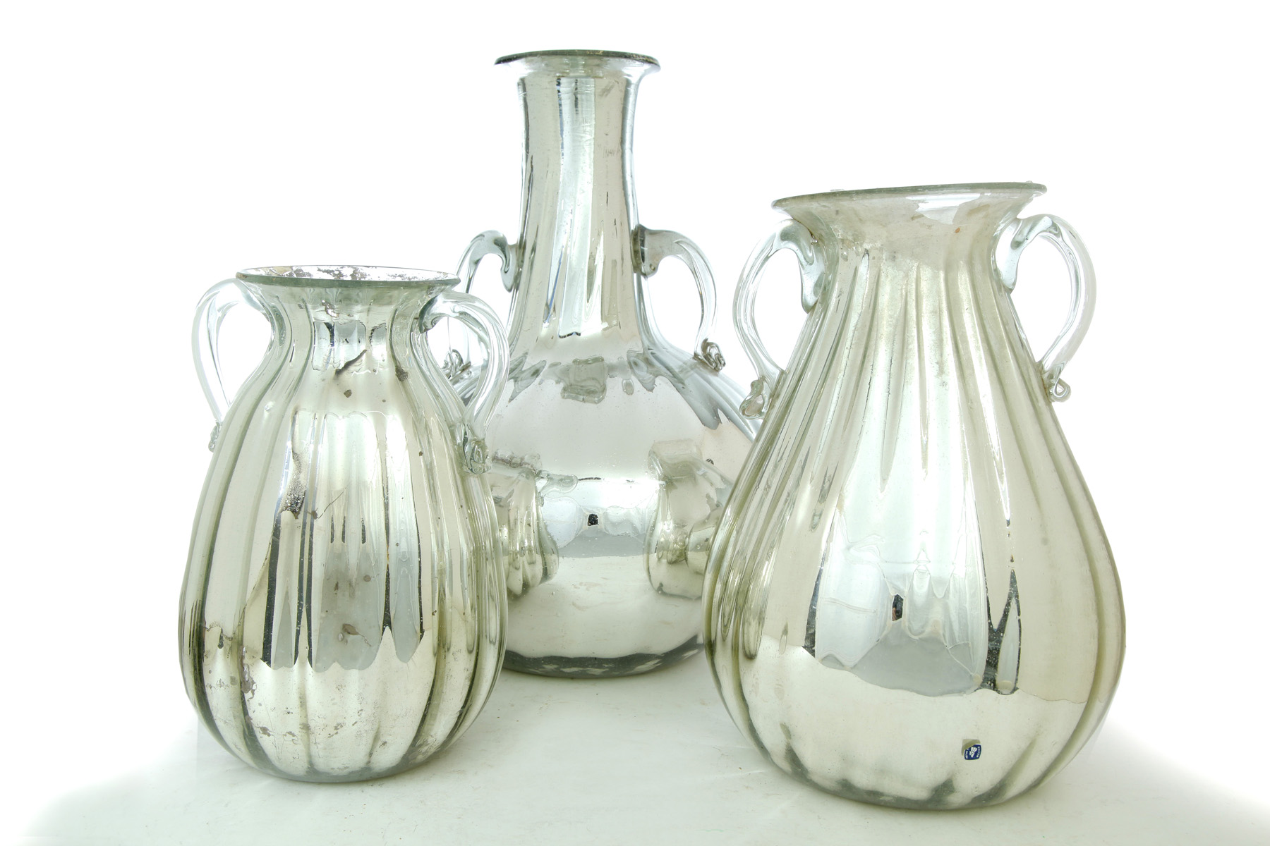 Appraisal: THREE OVERSIZE AMERICAN MERCURY GLASS VASES Late th century Ribbed