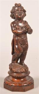 Appraisal: Antique Wood carving of a Praying Child Dressed in Animal