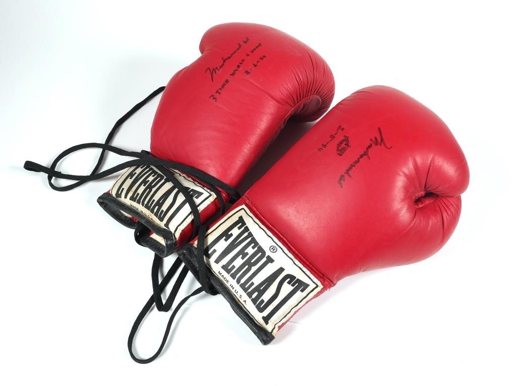 Appraisal: Pair Everlast leather boxing gloves signed by Muhammad Ali Both