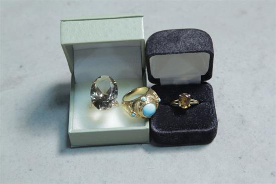 Appraisal: THREE GOLD RINGS One with large stone possibly Topaz and