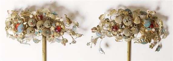 Appraisal: A PAIR OF SILVER HAIR NEEDLES WITH FRUIT MOTIF China