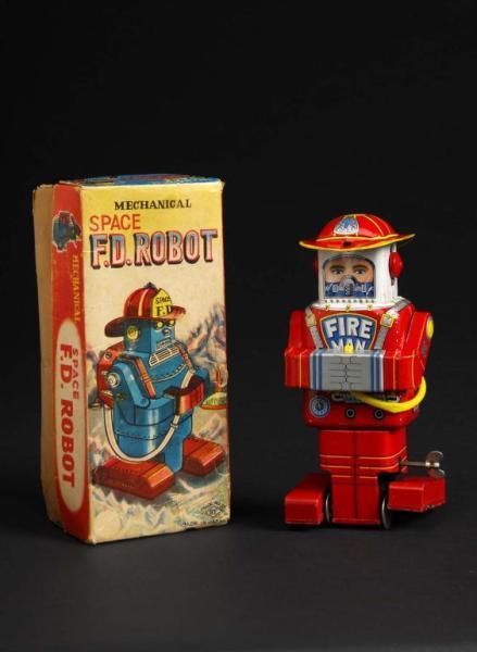 Appraisal: Tin Space Fireman Robot Description Japanese Made by SY Working