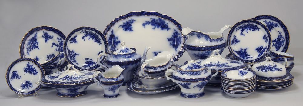 Appraisal: ENGLISH FLOW BLUE DINNER SERVICE IN THE TOURAINE PATTERN Circa