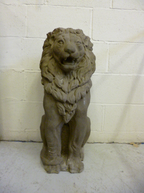 Appraisal: A COMPOSITION STONE LION SEJANT high