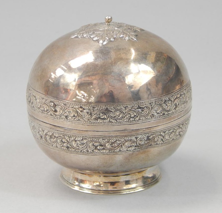 Appraisal: A white metal globular box and cover engraved with a