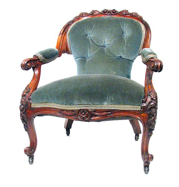 Appraisal: A Victorian carved walnut armchair height in width in depth