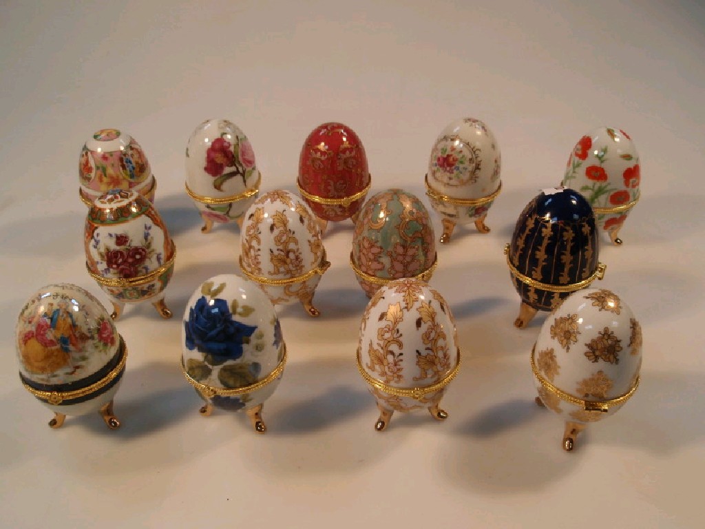 Appraisal: A collection of thirteen Faberge style eggs each variously decorated