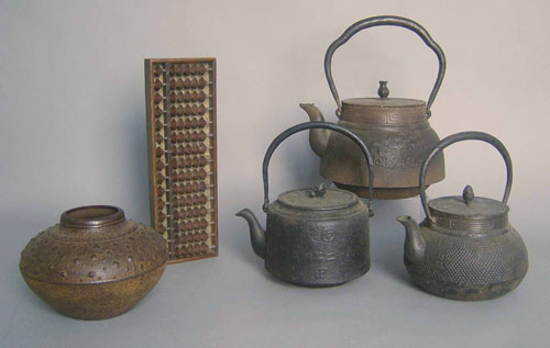 Appraisal: Three Chinese iron kettles together with a pot and abacus