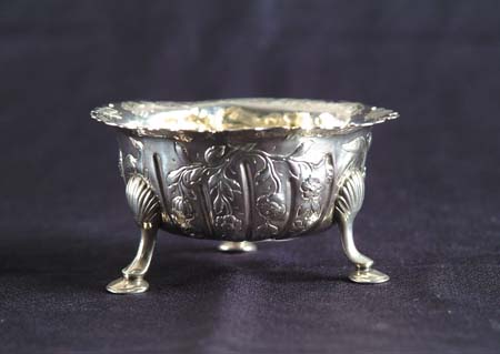 Appraisal: IRISH STERLING THREE-FOOTED SUGAR BOWL Notched flat rim rounded bottom