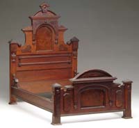 Appraisal: SALESMAN SAMPLE WALNUT BED FRAME Miniature and elaborate bed with