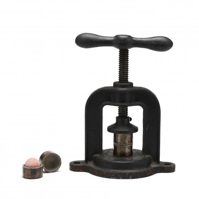 Appraisal: EARLY ENGLISH GOLF BALL PRESS AND MOLDS Circa cast iron