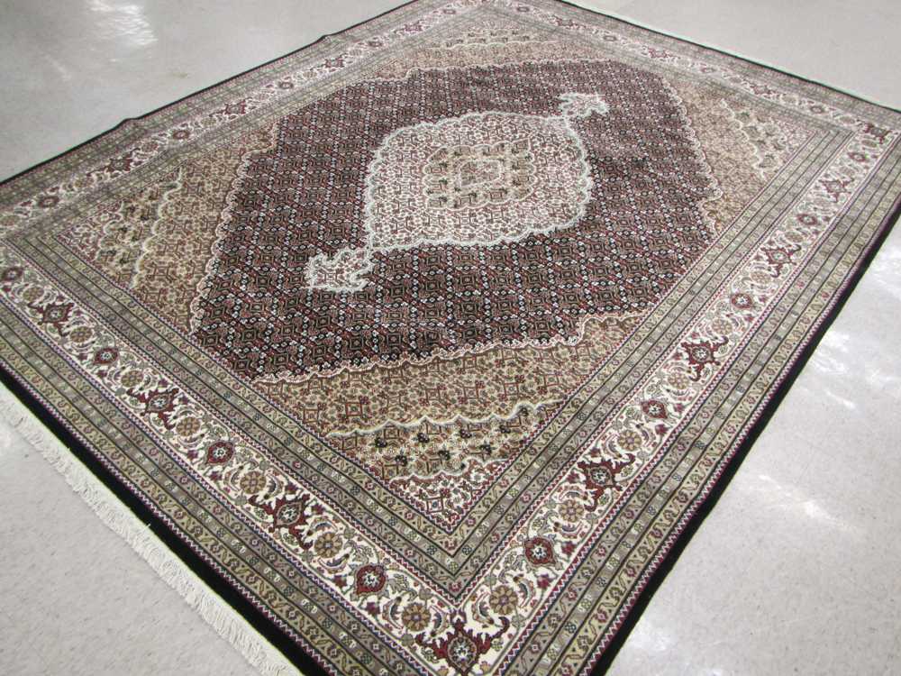 Appraisal: HAND KNOTTED ORIENTAL CARPET Indo-Bijar overall repeating diagonal Herati floral