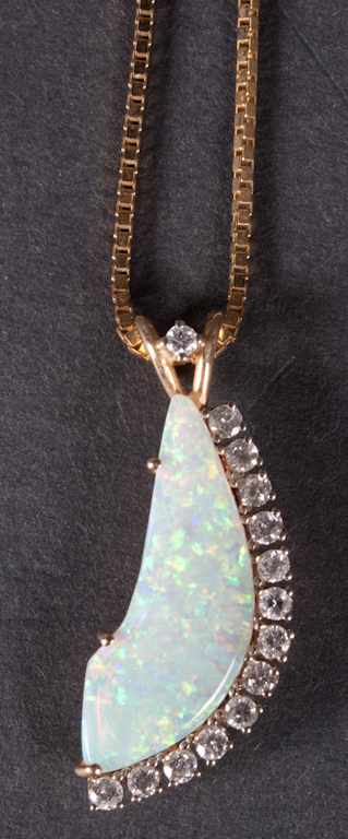 Appraisal: Lady's K yellow gold diamond and opal contemporary pendant necklace