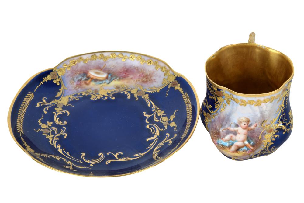 Appraisal: LIMOGES PORCELAIN COBALT GILT CUPID DEMITASSE SETcups marked Limoges -