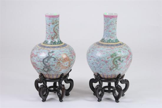 Appraisal: PAIR CHINESE FAMILLE ROSE VASES Dragon decoration on turquoise ground