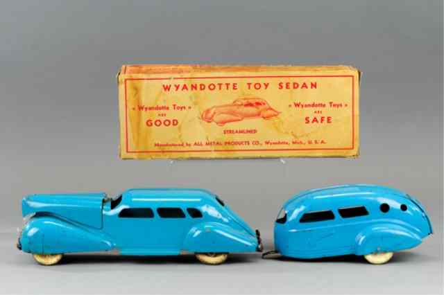 Appraisal: WYANDOTTE STREAMLINED SEDAN WITH TRAILER Pressed steel painted in blue