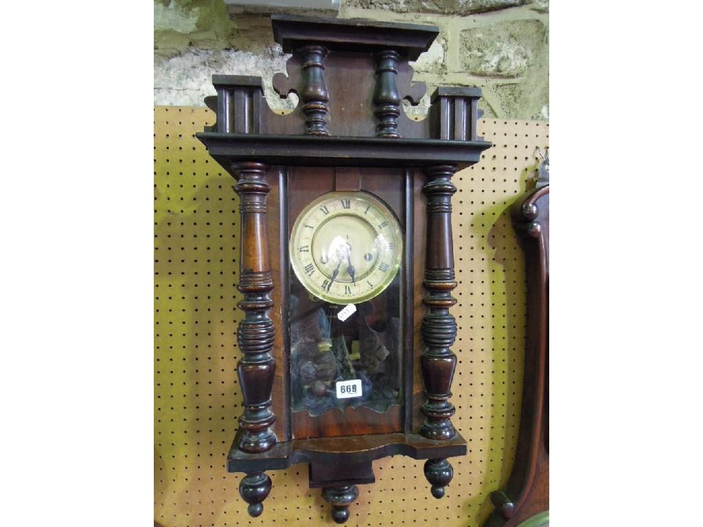 Appraisal: A th century mahogany cased wall clock with carved eagle