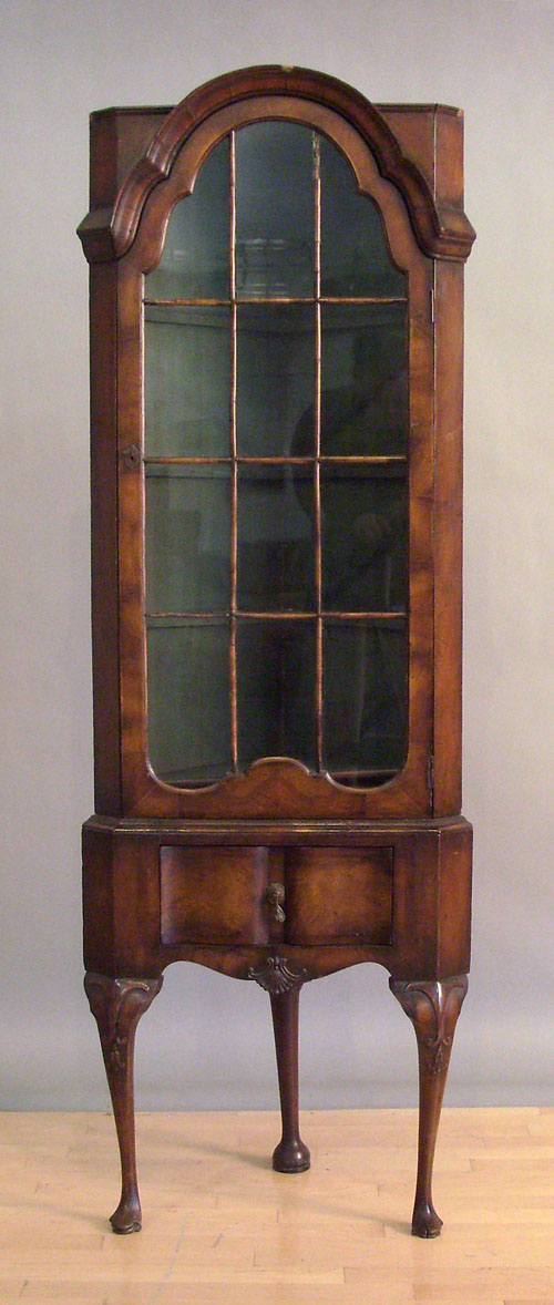 Appraisal: Georgian style burl veneer corner cabinet h w