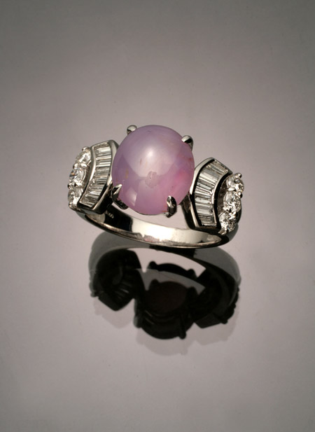 Appraisal: Platinum Star Sapphire and Diamond Dinner Ring The four-prong A-box