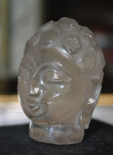 Appraisal: A CHINESE POSSIBLY ROCK CRYSTAL CARVED HEAD in the form