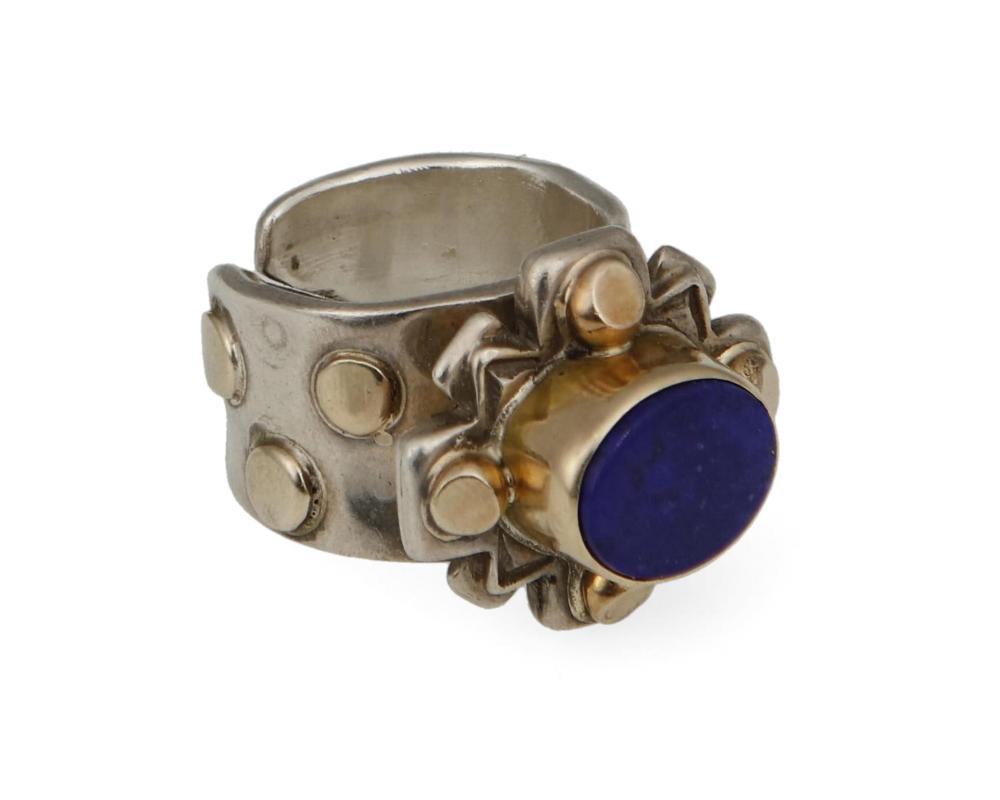 Appraisal: A sterling silver and gold lapis ring Late th st