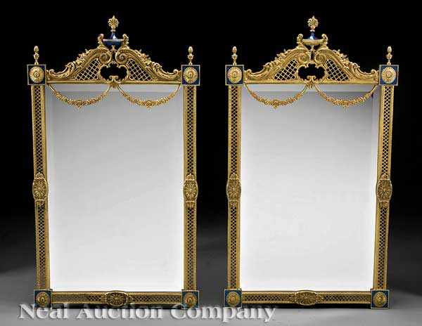 Appraisal: A Pair of Decorative Gilt Metal and Blue Enamel Mirrors