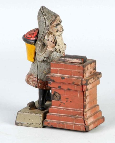 Appraisal: Cast Iron Santa at Chimney Mechanical Bank Description Manufactured by