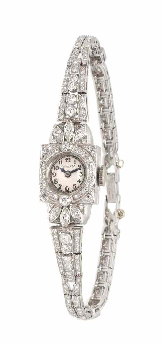 Appraisal: A Platinum and Diamond Mechanical Wristwatch Hamilton containing numerous single