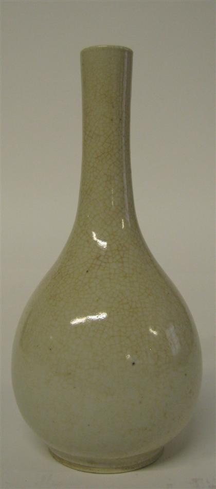 Appraisal: Chinese white crackle-glazed bottle form vase th th century