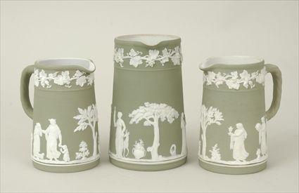 Appraisal: Three Wedgwood Green Jasperware Pitchers Marked to in