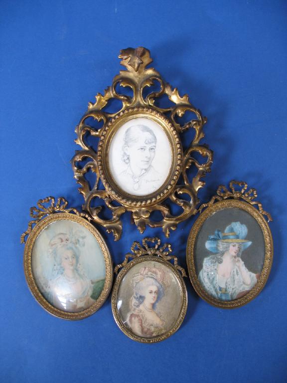 Appraisal: A PAIR OF BELLE EPOQUE MINIATURE PORTRAITS of ladies with