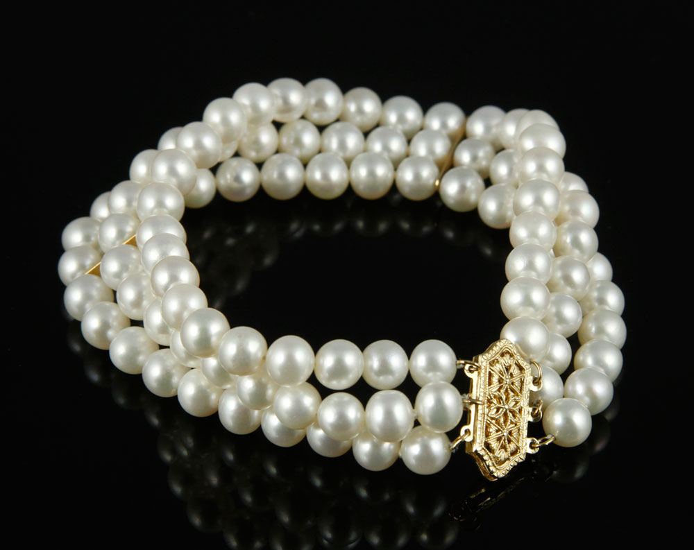 Appraisal: - Triple Strand Pearl Bracelet Triple strand pearl bracelet with