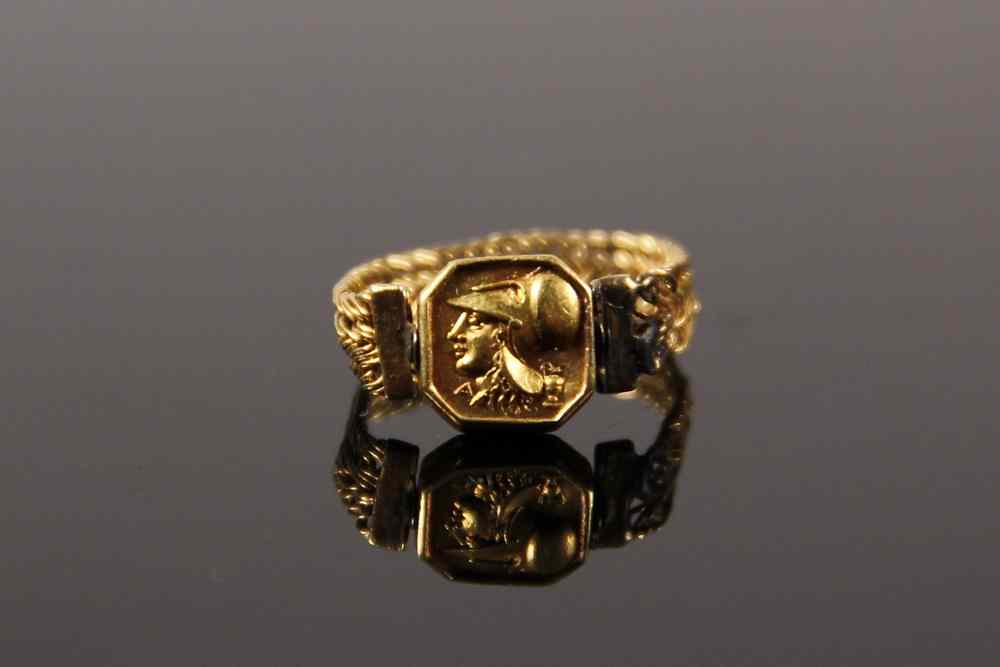 Appraisal: REVERSIBLE GOLD RING- in Ancient Greek style with a revolving