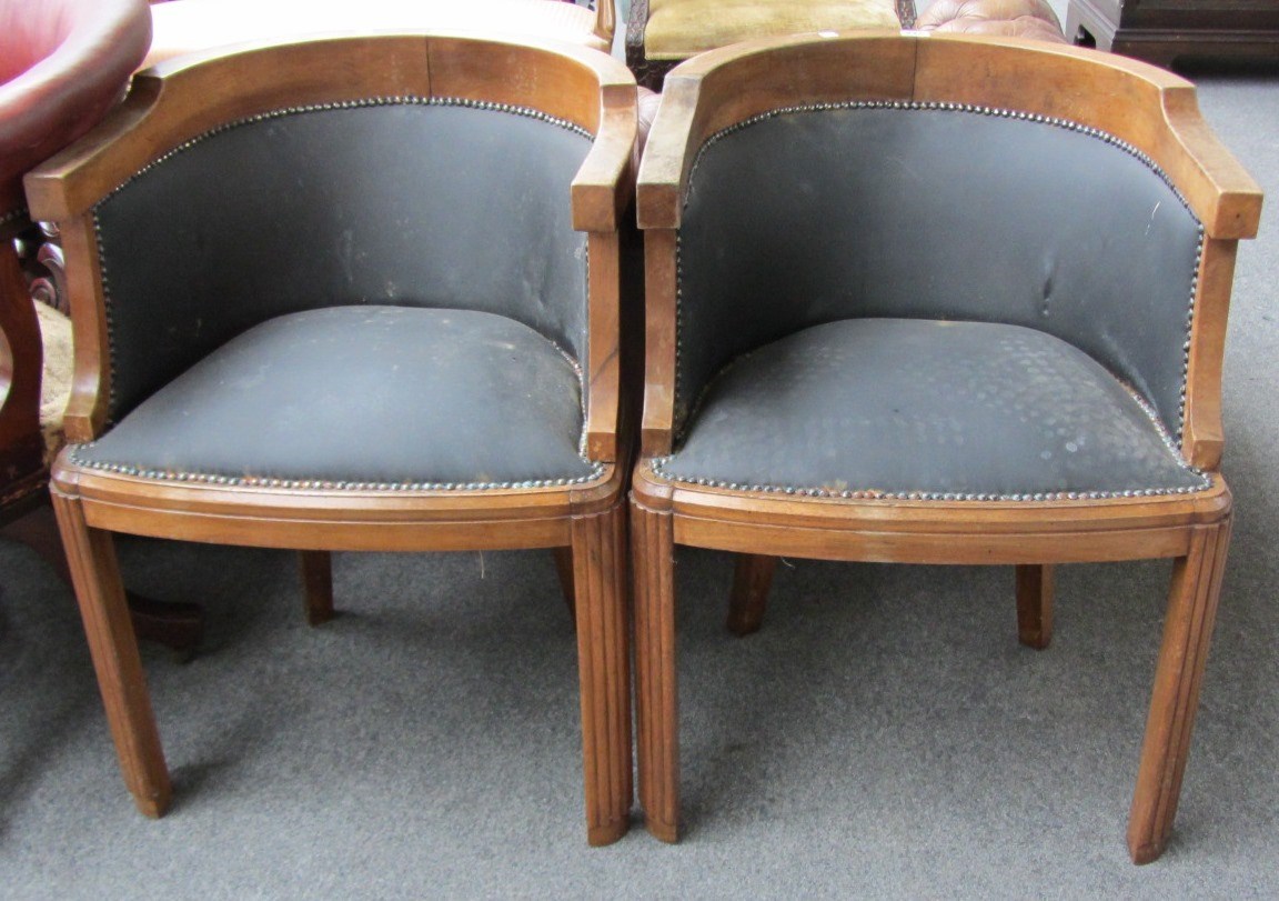 Appraisal: A pair of th century mahogany framed tub back chairs