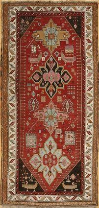 Appraisal: KARABAGH LONG RUG The tomato ground with snow flake medallions