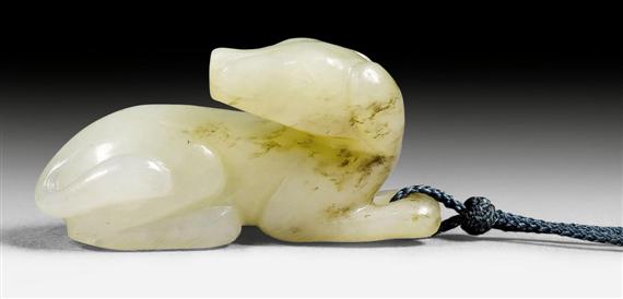 Appraisal: A CUTE AND SMALL WHITE JADE DOG China Qing dynasty