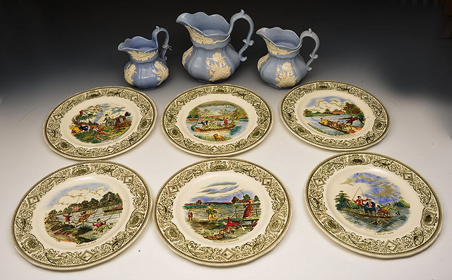 Appraisal: A GRADUATED SET OF THREE IRONSTONE BLUE AND WHITE JUGS