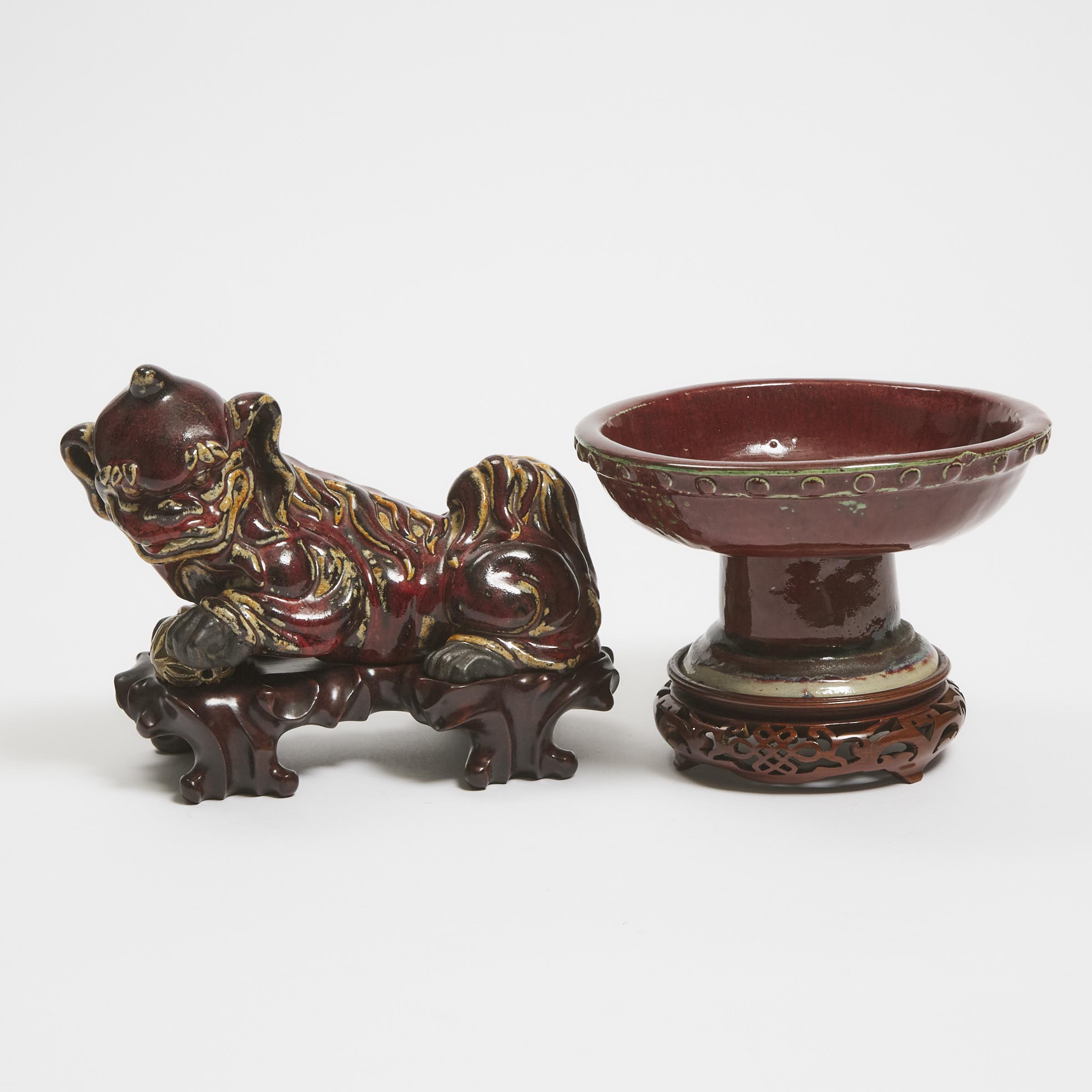 Appraisal: A Shiwan Red-Glazed Lion Together With a Shiwan Flamb Footed