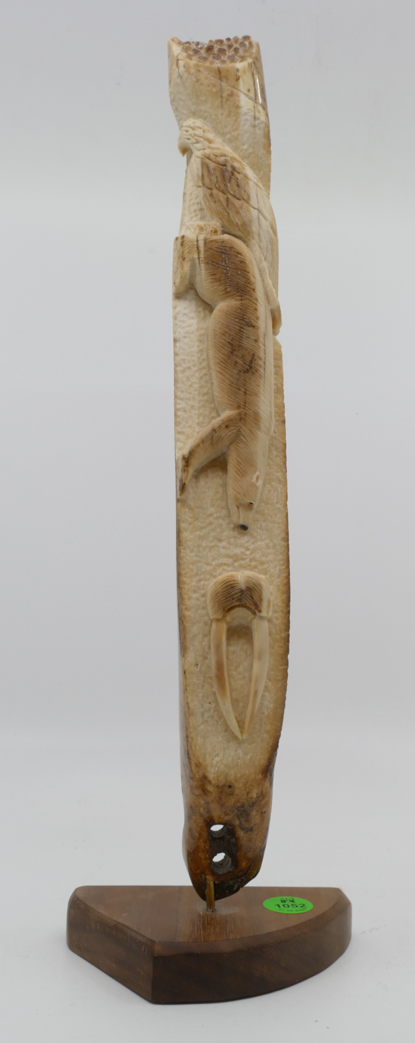 Appraisal: Sam Dimmick Alaskan Inuit Carved Animal Petrified Tusk Vertical Fragment