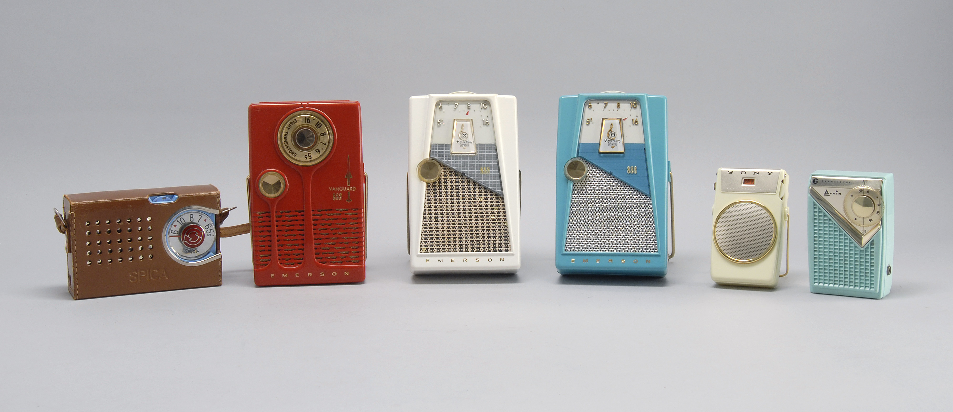 Appraisal: SIX TRANSISTOR RADIOS Emerson MODEL in red Emerson MODEL in