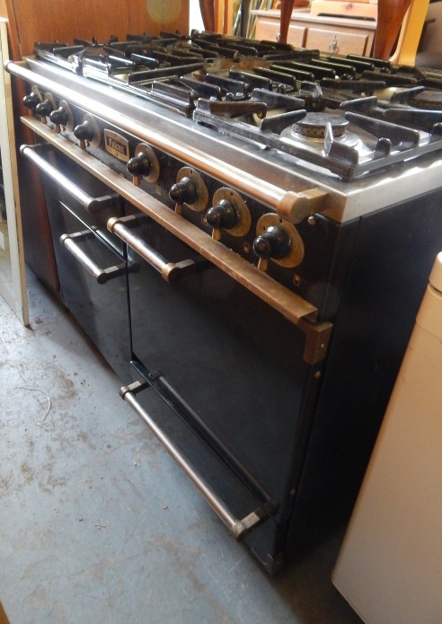 Appraisal: A Falcon black enamel brass and steel Range cooker with