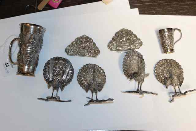 Appraisal: A SET OF FOUR INDIAN WHITE METAL TABLE PLACE MARKERS