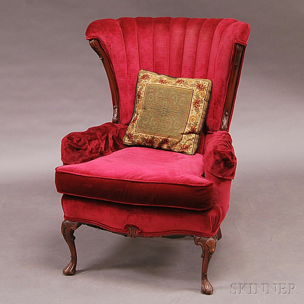 Appraisal: Victorian Carved Walnut Velvet-upholstered Armchair late th century ht in