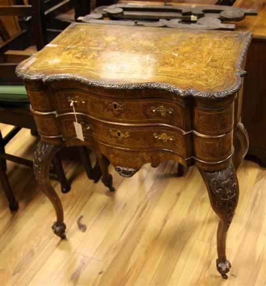 Appraisal: An early th century Dutch marquetry inlaid walnut serpentine dressing